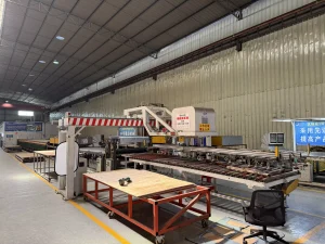 Uses vacuum/magnetic suction to grip sheets, robotic arms for precise handling, with sensors and control systems for automated processing.