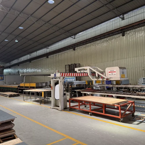 Uses vacuum/magnetic suction to grip sheets, robotic arms for precise handling, with sensors and control systems for automated processing.