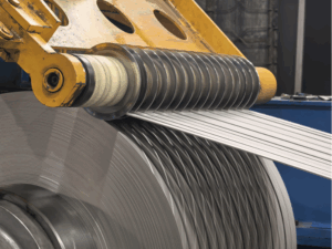 A Heavy Gauge Cut To Length Line is a special machine. It changes thick metal coils into flat sheets or plates.