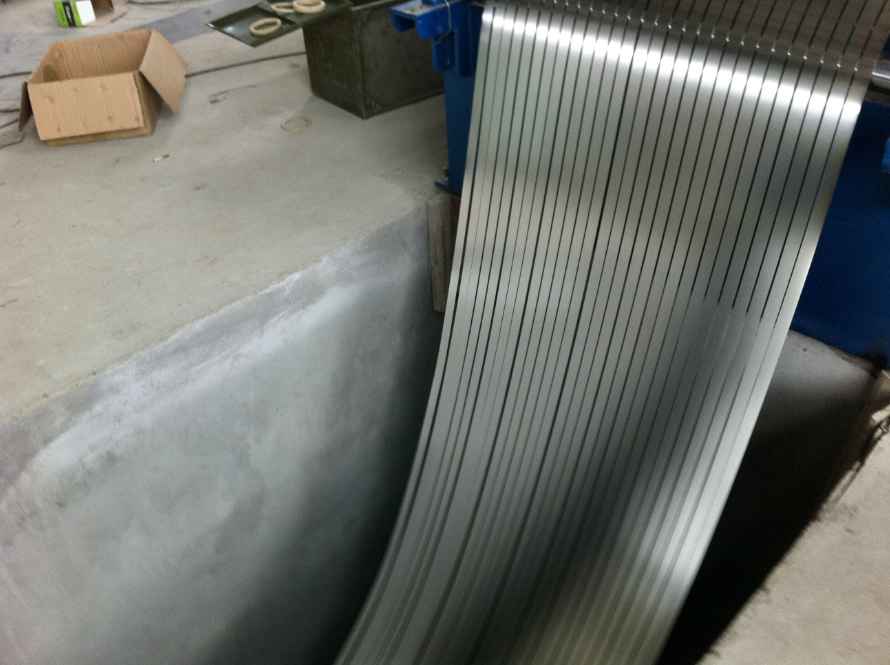 Precision slitting machines cut metal coils into narrow strips accurately.