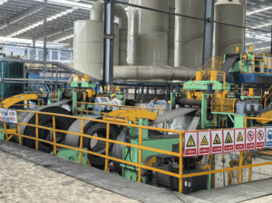 A pickling line removes scale and rust from metal surfaces for further processing. Steps include uncoiling, pickling, rinsing, drying, and recoiling.