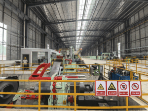 A pickling line removes scale and rust from metal surfaces for further processing. Steps include uncoiling, pickling, rinsing, drying, and recoiling.